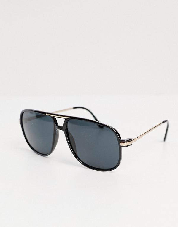 ASOS DESIGN 70s aviator sunglasses with smoke lens and gold detail frame in black