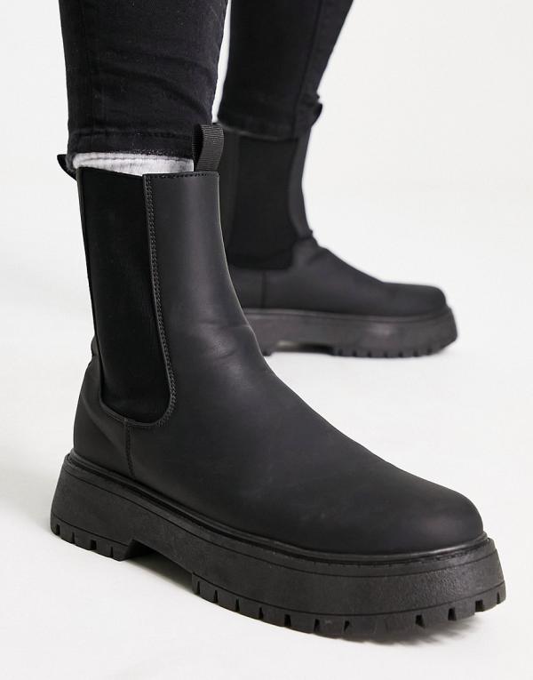 ASOS DESIGN chelsea calf boots with chunky sole in black faux leather