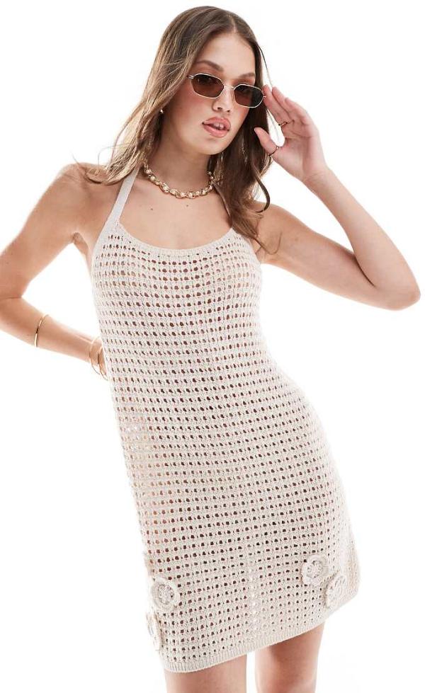 ASOS DESIGN holiday knitted halter mini dress with 3D flowers in cream-Neutral