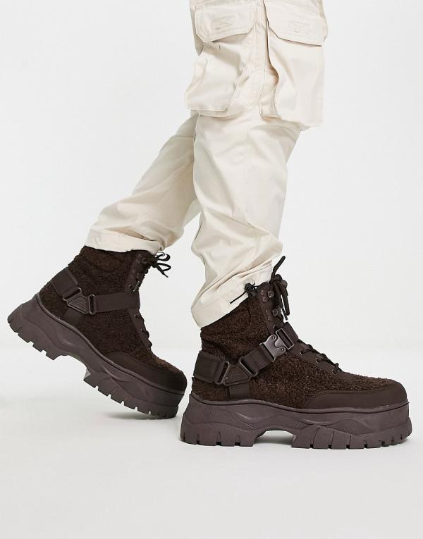 ASOS DESIGN lace up boots in brown borg with strap detail on chunky sole