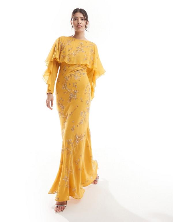 ASOS DESIGN Modesty embellished long sleeve ruffle bias maxi dress with cape detail in mustard-Yellow