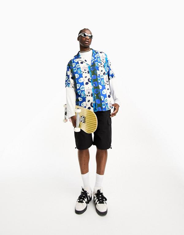 ASOS DESIGN oversized revere longline bowling shirt in blue floral photographic patchwork print