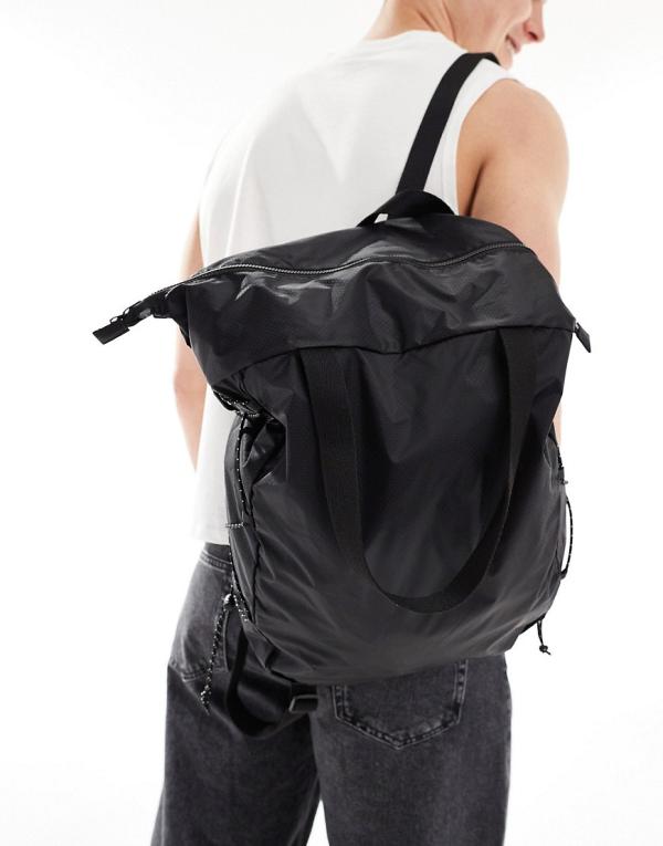 ASOS DESIGN packable backpack / tote bag with cord ties in black