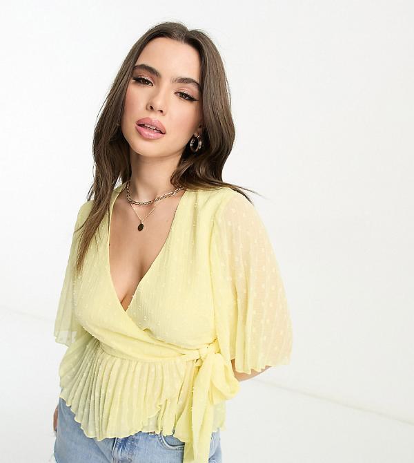 ASOS DESIGN Petite dobby wrap short sleeve blouse with pleated peplum hem in lemon-Yellow