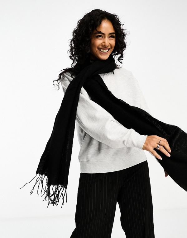 ASOS DESIGN supersoft scarf with tassels in black