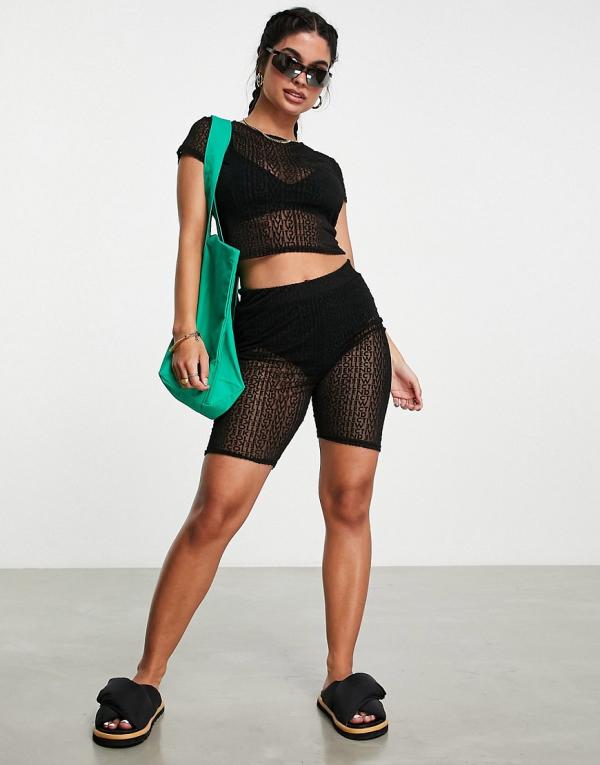 ASOS Weekend Collective legging shorts in flocked mesh graphic in black