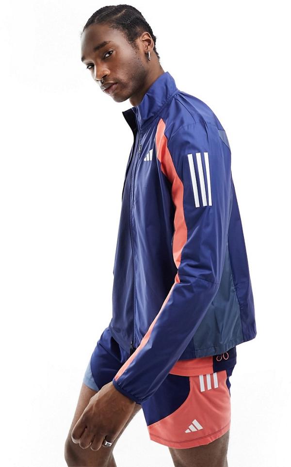adidas Running Own The Run jacket in navy and orange-Blue