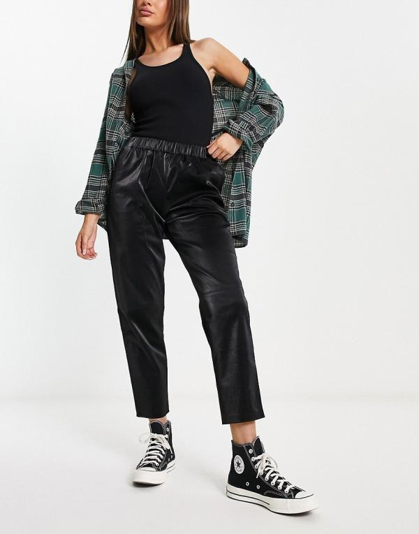 Blank NYC faux leather trackies in black