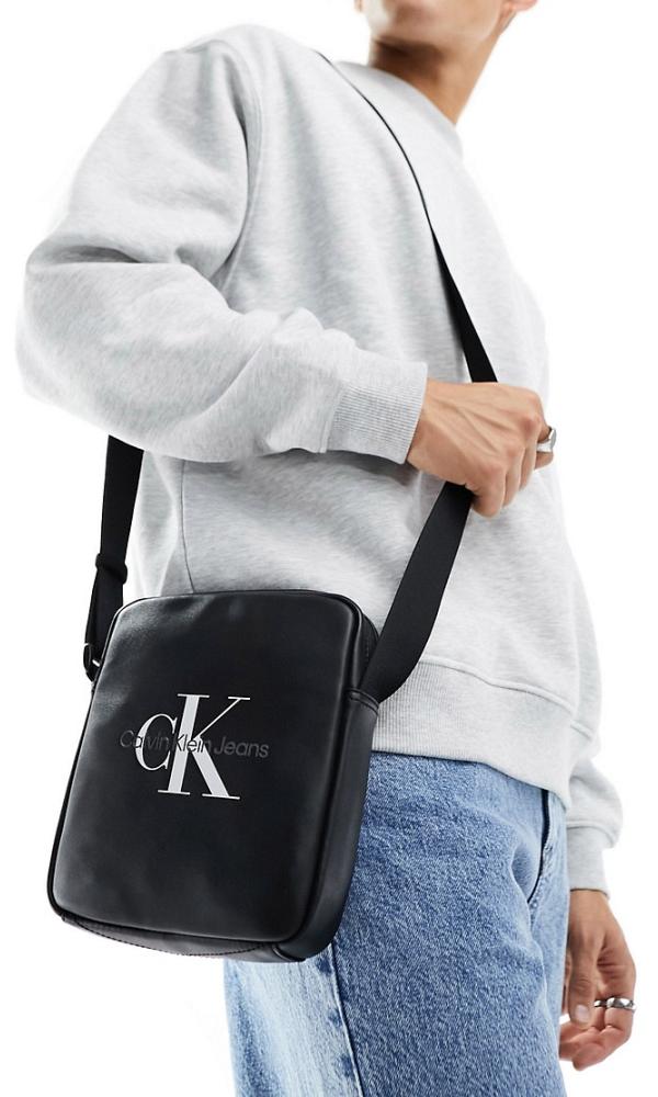 Calvin Klein Jeans monogram soft reporter bag in black
