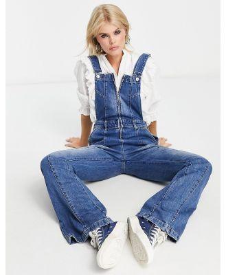 Free People Camilla slim bootcut flared jumpsuit in river blue