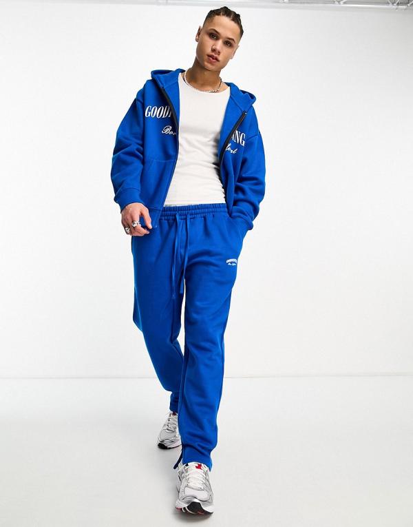 Good For Nothing straight leg trackies in cobalt blue with logo print and hem split (part of a set)
