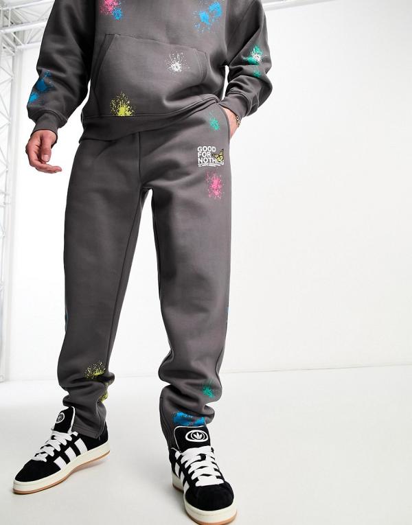 Good For Nothing straight leg trackies in grey with paint splatter and hem split (part of a set)