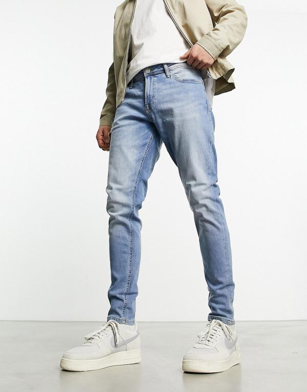 Jack & Jones Intelligence Pete tapered fit jeans in light blue wash