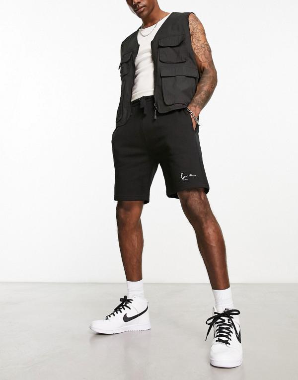 Karl Kani small signature jersey shorts in black