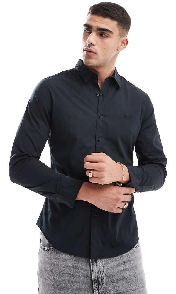 Levi's Battery batwing logo slim fit poplin shirt in black