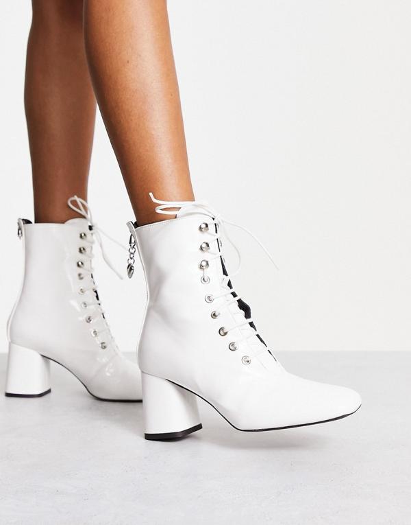 Love Moschino lace up boots with zip back in white
