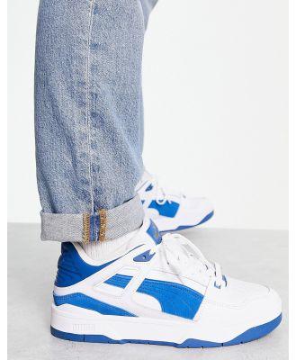 Puma Slipstream sneakers in white with blue suede detail-Multi
