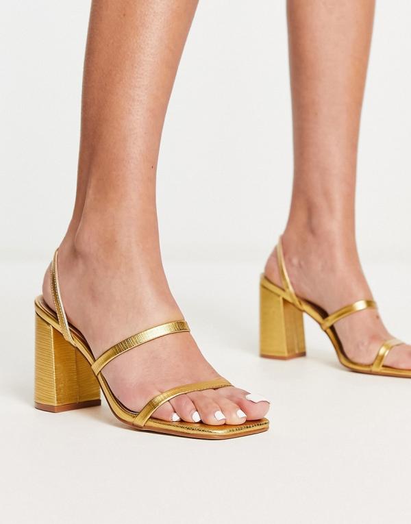 RAID Libra block heeled sandals in gold lizard