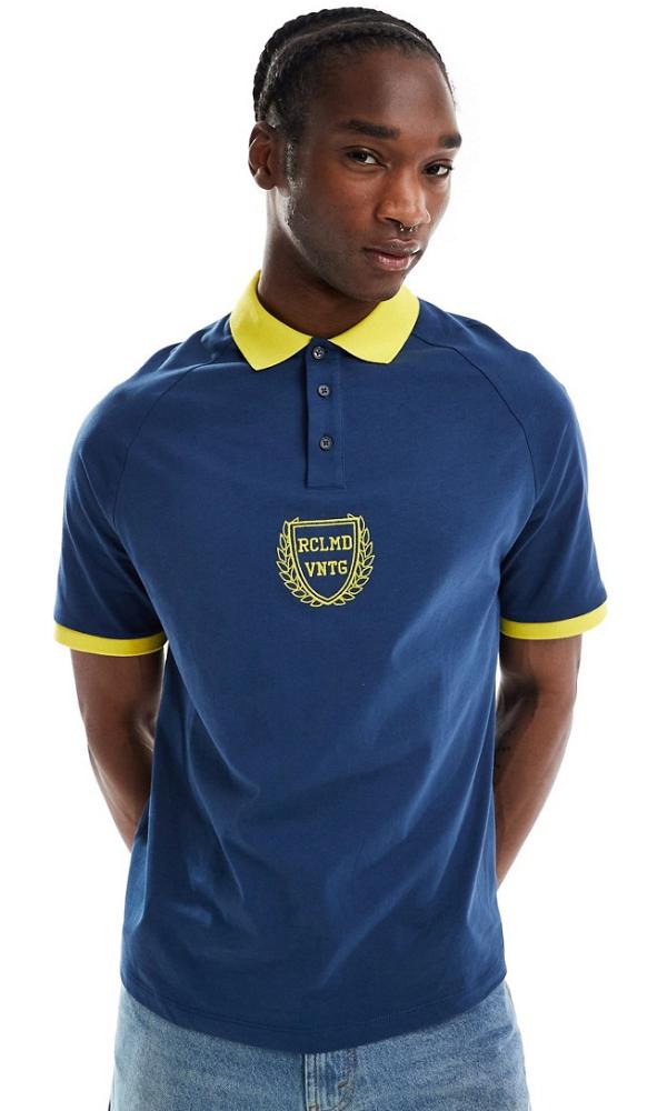 Reclaimed Vintage oversized sports polo top in navy and yellow-Blue