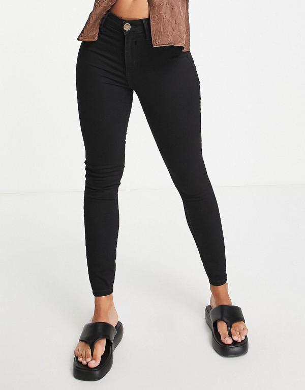 River Island Molly mid rise reform skinny jeans in black