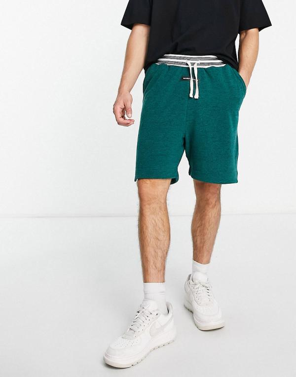 The Couture Club jersey shorts in green teddy fleece (part of a set)