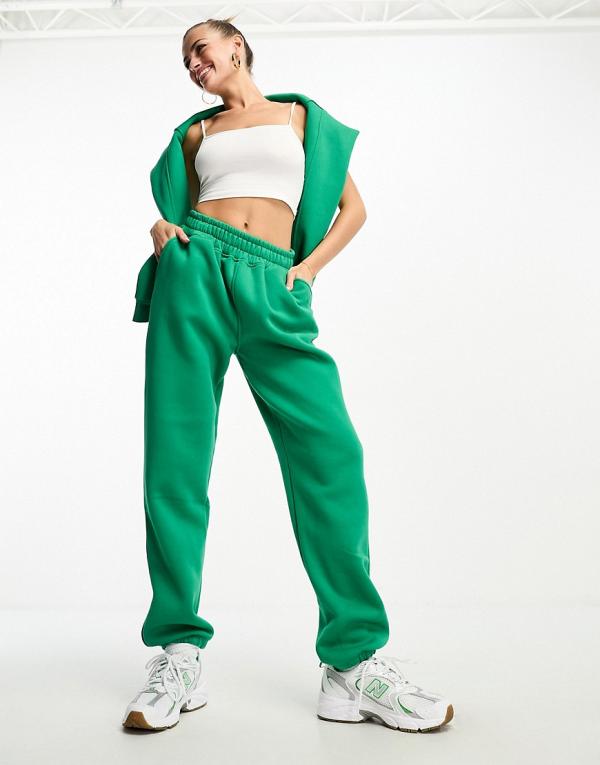 The Couture Club tonal logo oversized trackies in green