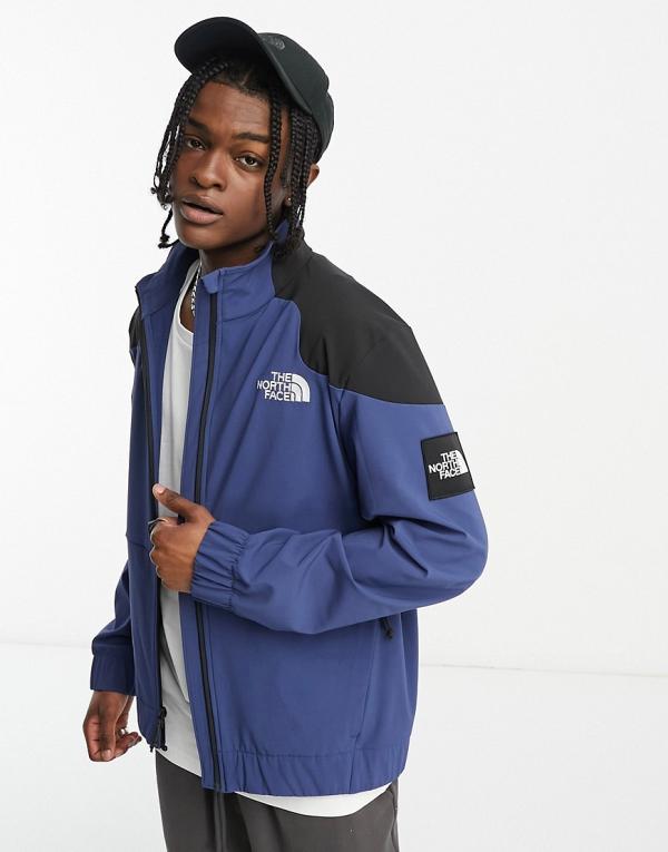 The North Face NSE Carduelis zip-up softshell track jacket in navy and black