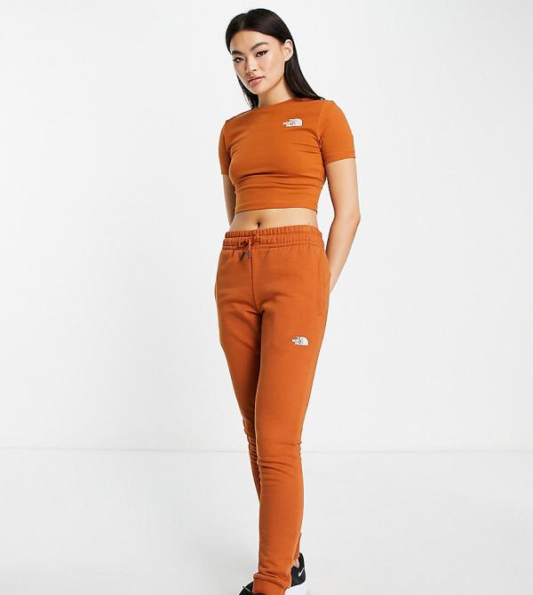 The North Face skinny trackies in brown Exclusive at ASOS