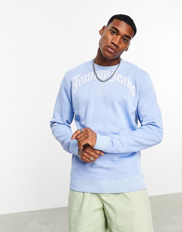 Tommy Jeans relaxed grunge arch logo crew neck sweatshirt in light blue