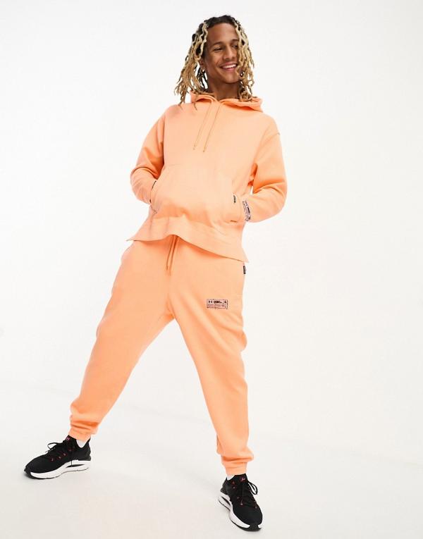 Under Armour Summit blend trackies in orange (part of a set)