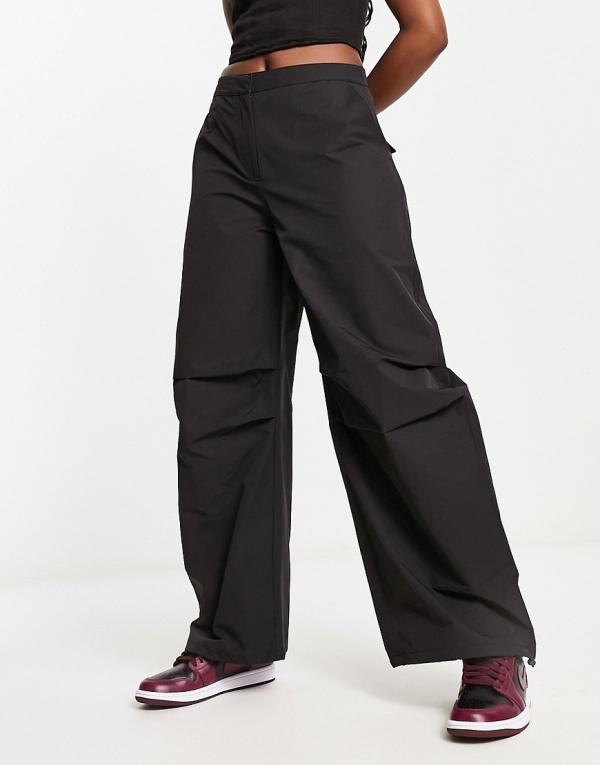 Weekday Nilo oversized tracksuit pants in black (part of a set)