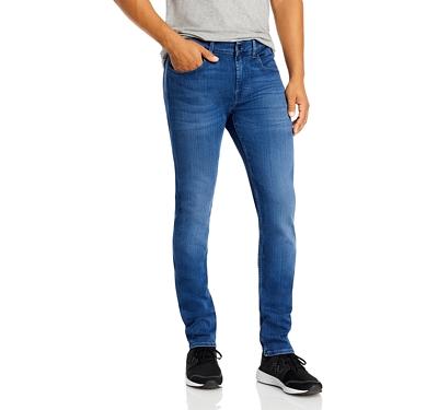 7 For All Mankind Luxe Performance Plus Slimmy Tapered Slim Fit Jeans in Mid Blue