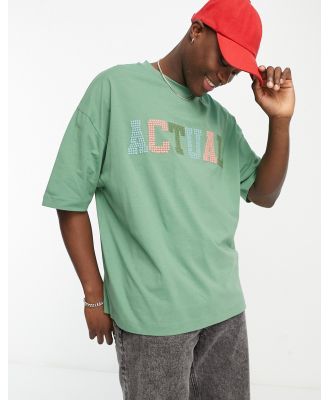 ASOS Actual oversized t-shirt with cross stitch logo in green
