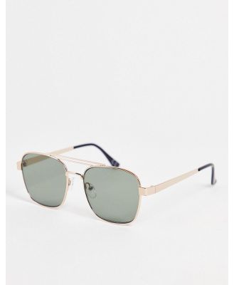 ASOS DESIGN 70s aviator sunglasses in gold metal with retro lens and brow bar detail