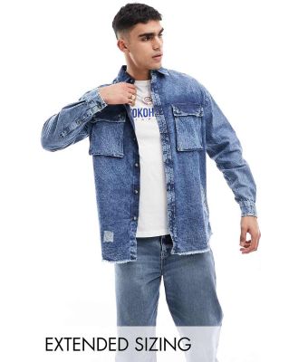 ASOS DESIGN 90s oversized shirt with distressed detail in acid wash blue