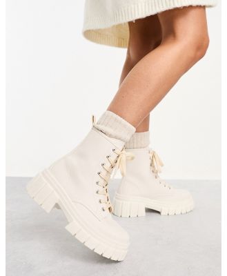 ASOS DESIGN Auto chunky lace up boots in off white