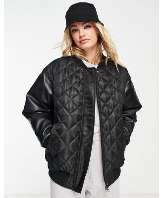 ASOS DESIGN bomber jacket with faux leather sleeves in black