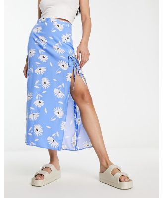 ASOS DESIGN bow detail midi skirt with thigh split in blue daisy print