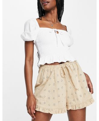ASOS DESIGN broderie shorts with ruffle hem and tie waist in neutral