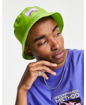 ASOS DESIGN bucket hat in bright green with escapism print (part of a set)