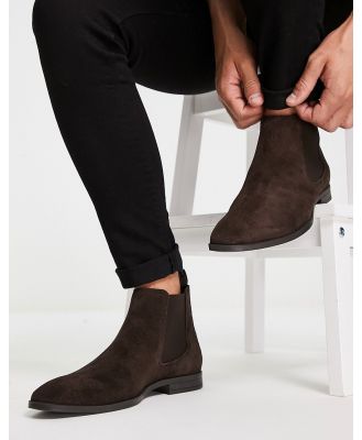 ASOS DESIGN chelsea boots in brown suede with black sole