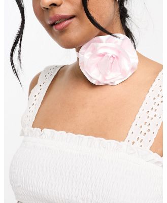 ASOS DESIGN choker necklace with corsage ribbon wrap detail in pink