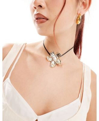 ASOS DESIGN choker necklace with hammered corsage detail with faux pearl detail in gold tone