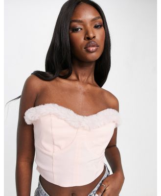 ASOS DESIGN corset with faux-fur trim in baby pink