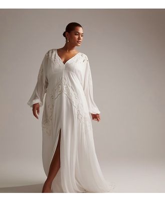 ASOS DESIGN Curve Florence plunge long sleeve wedding dress with cutwork in ivory-White