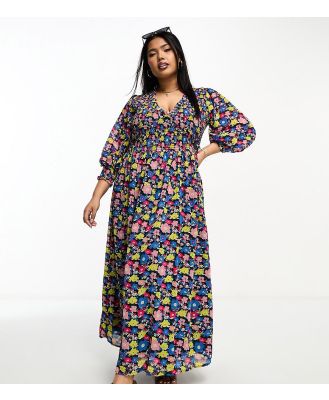 ASOS DESIGN Curve midi smock dress with shirred cuffs in black based multi floral print