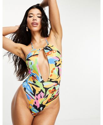 ASOS DESIGN cut out halter neck swimsuit with super high leg in abstract print-Multi