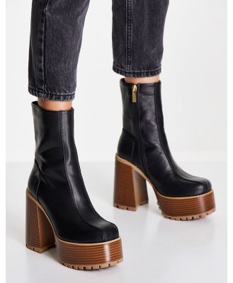 ASOS DESIGN Emotive high heeled platform ankle boots in black