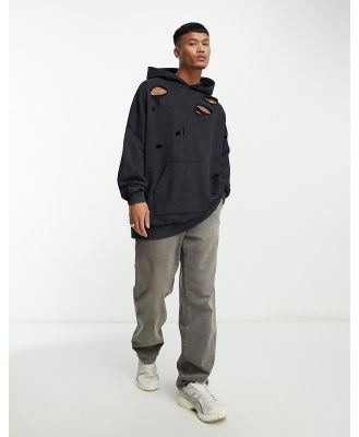 ASOS DESIGN extreme oversized hoodie in washed black with distressing
