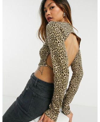 ASOS DESIGN fitted top with open tie back in micro animal print-Multi